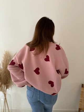 Red hearts pink sweater