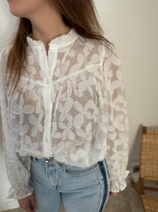 White flowered blouse