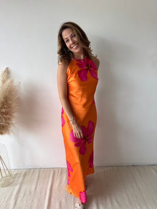 Fuchsia flowers orange dress