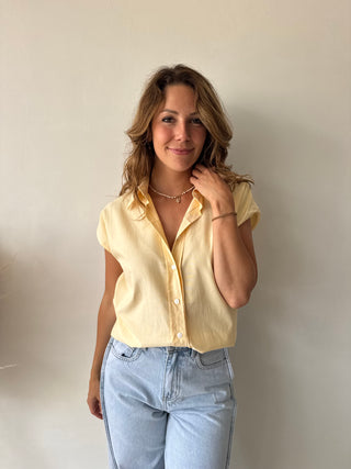 Yellow sleeveless shirt