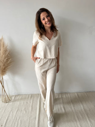 Beige open back linen jumpsuit