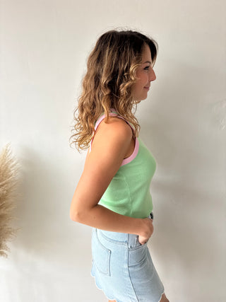 Pink details green top