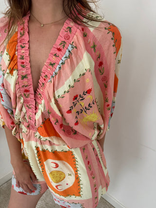 Orange pink flowered playsuit