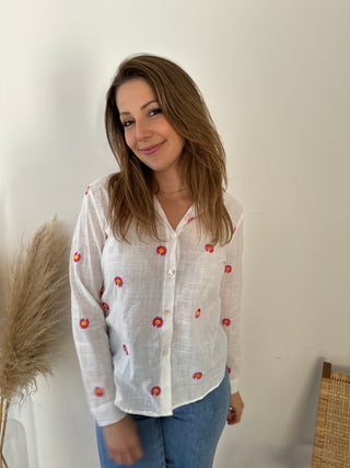 Pink daisies white blouse