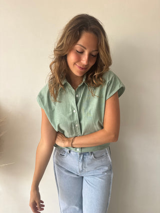 Green sleeveless shirt