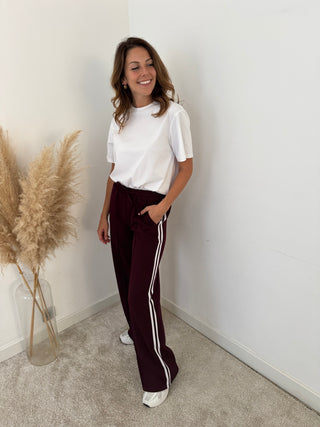 White stripe burgundy pants