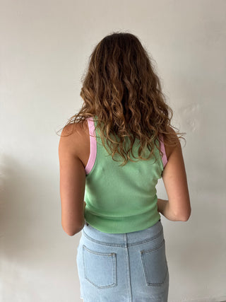 Pink details green top