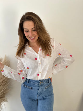 Pink daisies white blouse