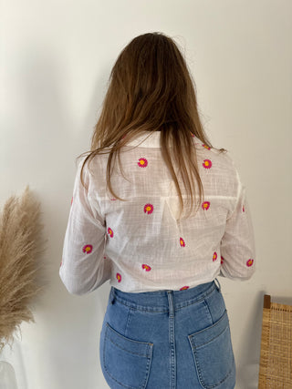 Pink daisies white blouse