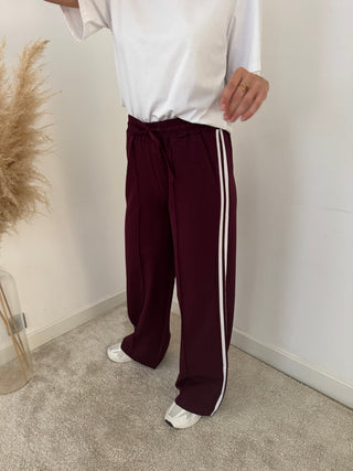 White stripe burgundy pants