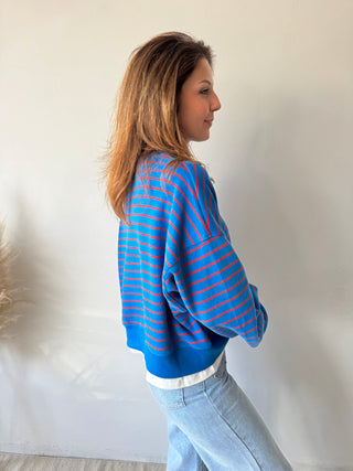 blue red striped sweater