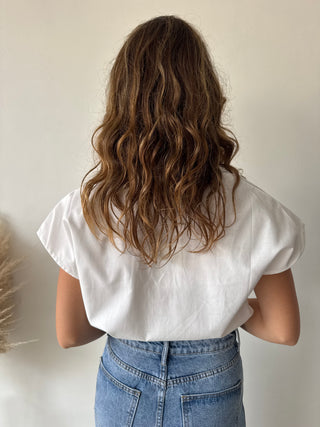 White sleeveless shirt