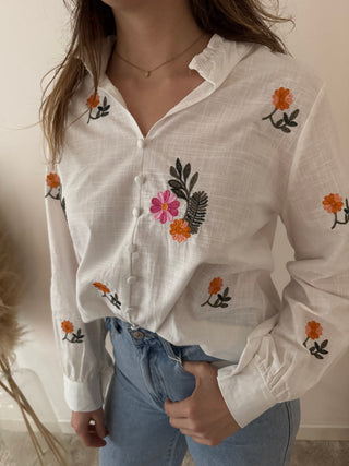 Colorful flowers white blouse