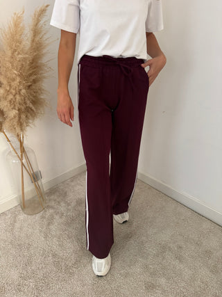 White stripe burgundy pants