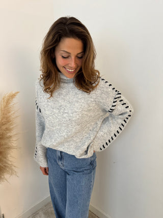 Grey stitched turtleneck knit