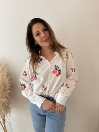 Colorful flowers white blouse