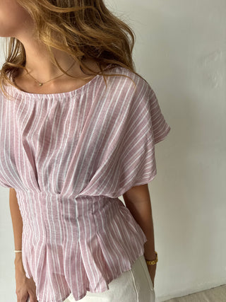 Pink peplum top