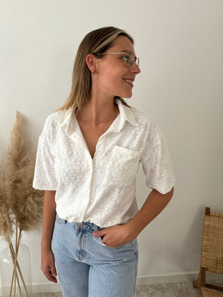 White flowers button top