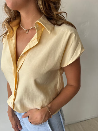 Yellow sleeveless shirt