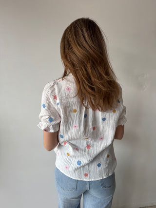 Colorful flowers white top