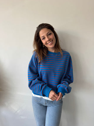 blue red striped sweater