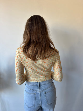 Yellow flowered long sleeve top