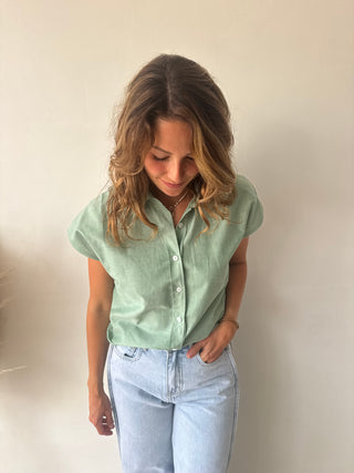 Green sleeveless shirt