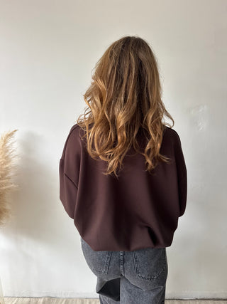 Red details brown sweater