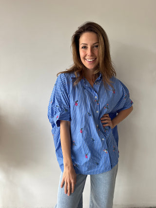 Oversized flowered blue blouse
