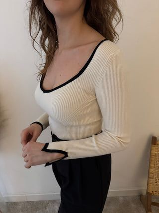 Black details beige top