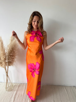 Fuchsia flowers orange dress