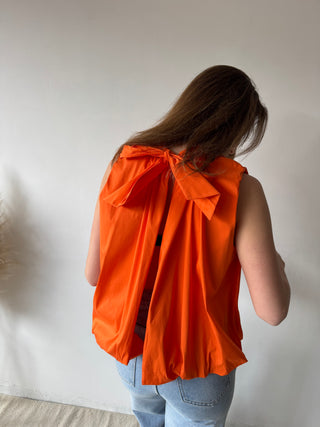Open back bow orange top