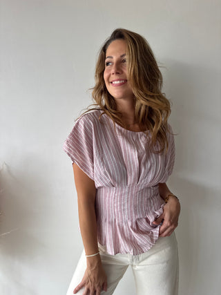 Pink peplum top