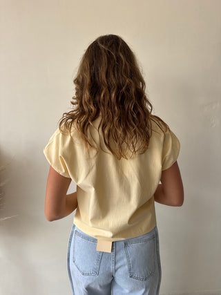Yellow sleeveless shirt