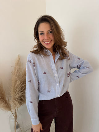 Burgundy flowers blue shirt