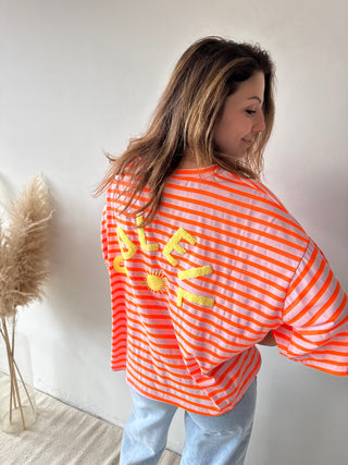 Orange pink striped soleil top