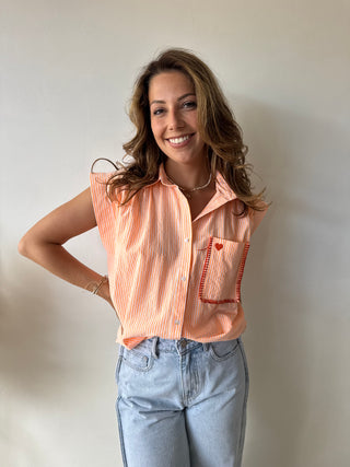 Heart pocket orange striped top