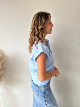 Blue sleeveless shirt