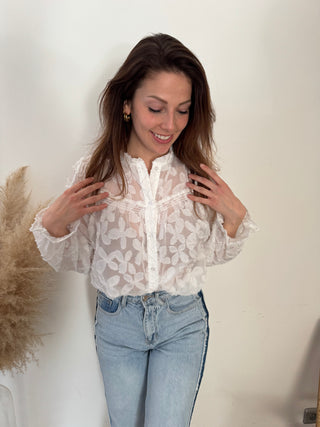 White flowered blouse