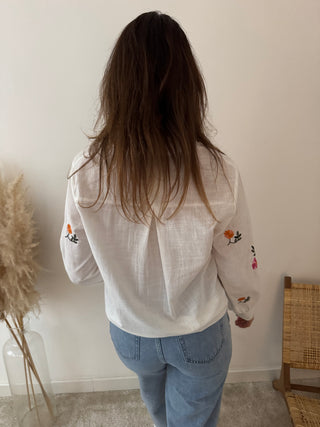 Colorful flowers white blouse