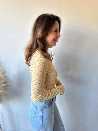 Yellow flowered long sleeve top