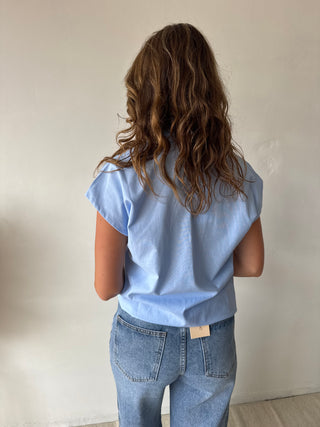 Blue sleeveless shirt