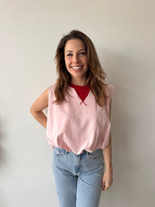 Red detail pink top