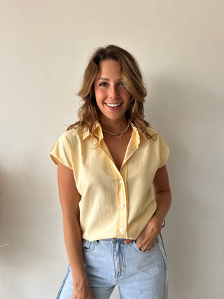 Yellow sleeveless shirt