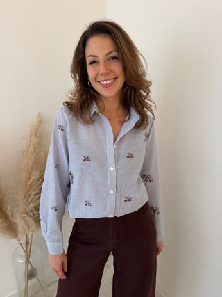 Burgundy flowers blue shirt