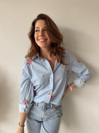 Red flowers blue blouse