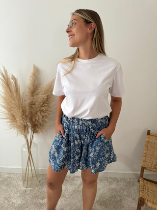 White embroidered flowers blue short