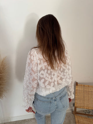 White flowered blouse