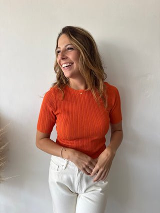 Orange ribbed top