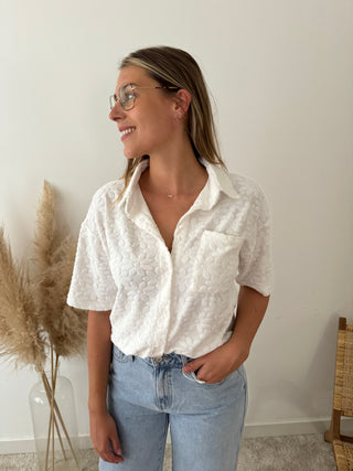 White flowers button top